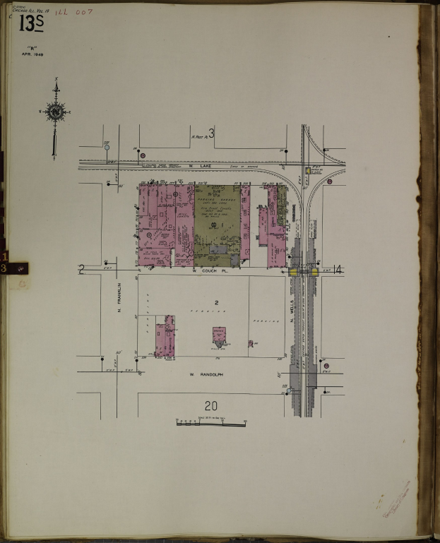 Offenes Buch mit detaillierter Stadtplanzeichnung und Text auf seinen Seiten.