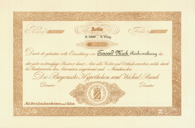 Altes Aktienzertifikat mit goldenem Rand, das ein Männerporträt, Text und wahrscheinlich eine Anleihebezeichnung zeigt.