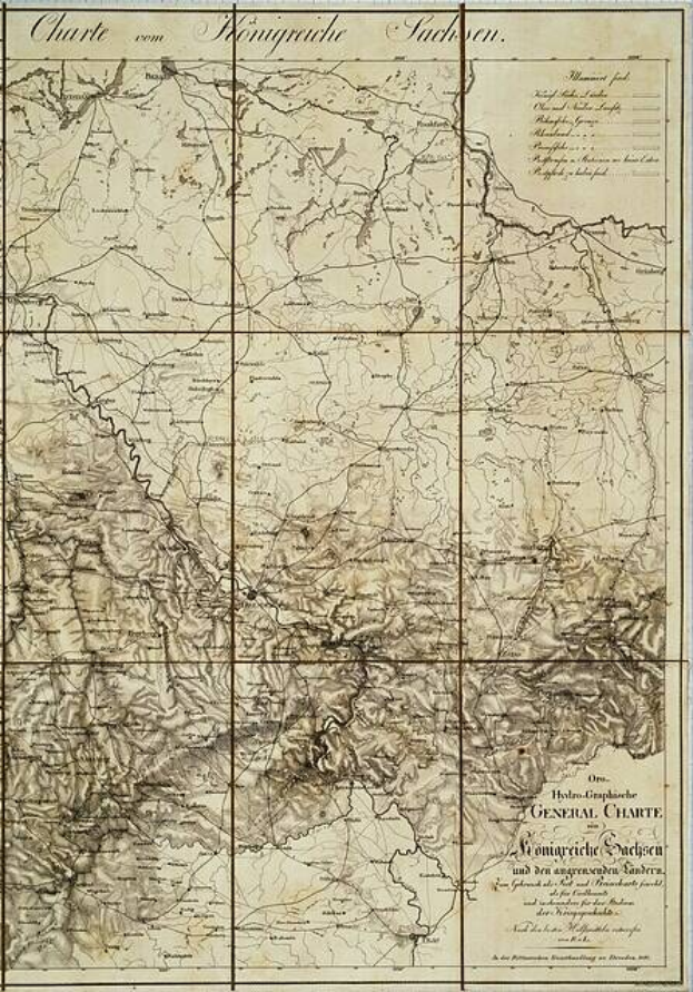 Eine Karte des britischen Empire aus dem 19. Jahrhundert mit einer detaillierten Karte des Königreichs Sachsen-Anhalt, gedruckt auf altem Papier mit sichtbarem Text.