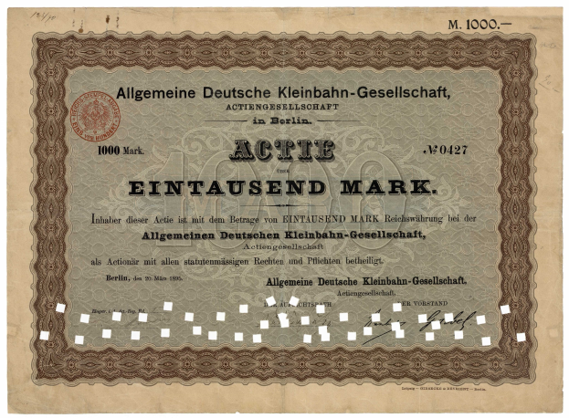 Alte deutsche Staatsanleihe mit gedrucktem Text und einem offiziellen Stempel.