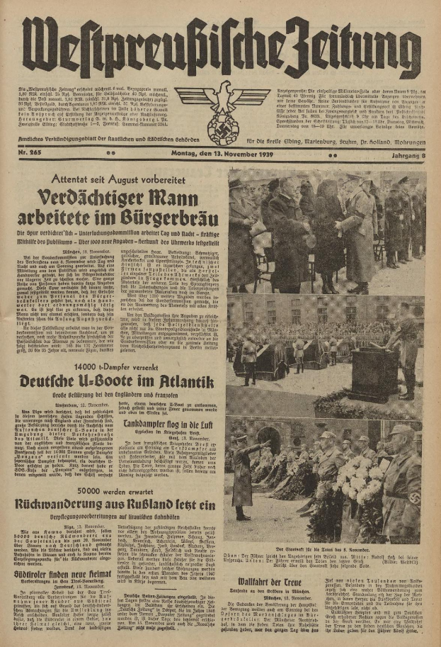Alte deutsche Zeitungsvorderseite vom 13. November 1939 mit der Schlagzeile "Weitpreubliche Zeitung" und einer Gruppe von Menschen in traditioneller deutscher Kleidung in einer feierlichen Umgebung.